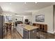 Bright and spacious kitchen with an island and stainless steel appliances, perfect for entertaining guests at 22646 E Glidden Dr, Aurora, CO 80016