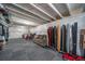 Spacious basement featuring carpeted floors, exposed ceiling, and plenty of room for storage and customization at 11442 Booth Falls Ct, Parker, CO 80134