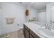 Comfortable bathroom featuring a large vanity, and bright light at 11442 Booth Falls Ct, Parker, CO 80134