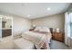 Cozy bedroom with a comfortable bed, natural light, and a calming ambiance at 11442 Booth Falls Ct, Parker, CO 80134