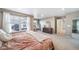 Spacious main bedroom with plush carpet, large windows, and neutral tones at 11442 Booth Falls Ct, Parker, CO 80134
