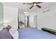 Bright bedroom with hardwood floors, a ceiling fan, and a cozy chest at 2643 N Marion St, Denver, CO 80205