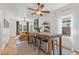 Dining area with bar-height table and chairs, open to the living room, offering great flow at 2643 N Marion St, Denver, CO 80205