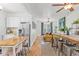 Bright, open-concept living and dining area featuring hardwood floors and modern finishes at 2643 N Marion St, Denver, CO 80205