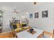 Bright living room with modern furniture flowing into dining area and open kitchen at 2643 N Marion St, Denver, CO 80205