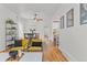 Bright and open living room seamlessly connecting to the dining and kitchen areas at 2643 N Marion St, Denver, CO 80205