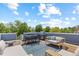 Stylish rooftop deck featuring ample seating and an outdoor grill, perfect for entertaining at 2643 N Marion St, Denver, CO 80205