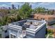View of a rooftop deck with outdoor furniture and city skyline views at 2643 N Marion St, Denver, CO 80205