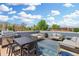 Rooftop deck with outdoor furniture, grill, and city views at 2643 N Marion St, Denver, CO 80205