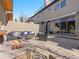 Outdoor patio area with comfortable seating around a fire pit, providing a perfect setting for relaxation at 4529 Vrain St, Denver, CO 80212