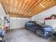 Clean, well-lit garage with a car parked inside at 4529 Vrain St, Denver, CO 80212