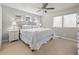Bright main bedroom with large windows, plush carpeting and comfortable layout at 4529 Vrain St, Denver, CO 80212