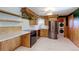 Updated kitchen with stainless steel appliances, tiled backsplash, and modern white countertops at 4580 Balsam St, Wheat Ridge, CO 80033
