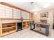Office with built-in cabinetry, modern lighting, tiled floor and unique decor at 7000 Highland Dr, Lakewood, CO 80214