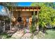 Charming wooden outbuilding surrounded by lush greenery, offering a unique backyard retreat at 7000 Highland Dr, Lakewood, CO 80214