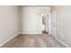 Comfortable bedroom features neutral carpeting and is adjacent to the bathroom at 7208 Dolores Ave, Frederick, CO 80530