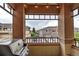Balcony view with outdoor grill overlooking other neighborhood homes and fenced yards at 837 E 98Th Ave # 403, Thornton, CO 80229