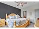 Comfortable main bedroom featuring a ceiling fan, and access to a ensuite bathroom at 837 E 98Th Ave # 403, Thornton, CO 80229