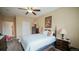 Cozy bedroom featuring a queen-sized bed and classic decor at 7656 Depew St # 1802, Arvada, CO 80003