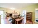 Comfortable living room with fireplace, seamlessly flowing into adjacent bedroom at 7656 Depew St # 1802, Arvada, CO 80003