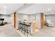 Basement space with bar seating, with tiled flooring, and recessed lighting at 9574 Las Colinas Dr, Lone Tree, CO 80124