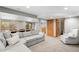Spacious finished basement with a comfortable seating area, dining space, and an adjacent bathroom at 9574 Las Colinas Dr, Lone Tree, CO 80124