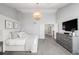 Bright main bedroom features a chandelier, closet, and an en-suite bathroom at 9574 Las Colinas Dr, Lone Tree, CO 80124