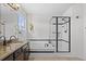 Bathroom featuring a soaking tub, glass-enclosed shower, and vanity with modern faucets at 9539 Bexley Dr, Highlands Ranch, CO 80126