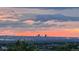 Scenic city view at sunset showing colorful clouds and buildings of town in the distance at 10837 Fox Sedge Way, Highlands Ranch, CO 80126