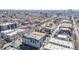 A view of the city including multi-story apartment buildings and single Gathering homes at 1080 E 13Th Ave # 301, Denver, CO 80218