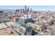 Cityscape view of Denver, CO, showcasing buildings in the downtown area and mountain views at 1080 E 13Th Ave # 301, Denver, CO 80218