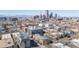 Cityscape view of Denver, CO, showcasing buildings in the downtown area with mountain views at 1080 E 13Th Ave # 301, Denver, CO 80218