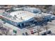 Whole Foods Market in a dense urban neighborhood with colorful mural and parking at 1080 E 13Th Ave # 301, Denver, CO 80218