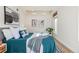 Bedroom showcasing modern decor with a tray ceiling at 1080 E 13Th Ave # 301, Denver, CO 80218