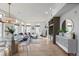 Bright and open living room features large windows, fireplace, and hardwood floors at 1080 E 13Th Ave # 301, Denver, CO 80218