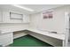 Basement storage with ample counter and cabinet space at 7079 S Tamarac Ct, Centennial, CO 80112