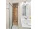 Bathroom with tiled shower, sink, and updated fixtures at 7079 S Tamarac Ct, Centennial, CO 80112