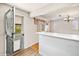 Cozy entryway leading to the kitchen with a breakfast bar at 7079 S Tamarac Ct, Centennial, CO 80112