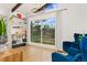 Bright room with big windows and white interior. View of nature at 1730 Ward Cir, Franktown, CO 80116