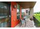 Cozy front porch with seating area perfect for relaxing and enjoying the neighborhood views at 2868 Kingston St, Denver, CO 80238