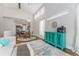Open-concept living room and dining area with stylish furnishings, cabinetry and high ceilings at 2868 Kingston St, Denver, CO 80238