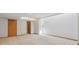 Spacious finished basement with carpet flooring, light walls and wood trim at 53 Taylor Ct, Castle Rock, CO 80104