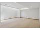Spacious finished basement with carpet flooring, and light walls at 53 Taylor Ct, Castle Rock, CO 80104