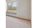 Bedroom featuring carpet floors, light walls and a window seat overlooking scenery at 53 Taylor Ct, Castle Rock, CO 80104