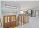 Inviting foyer with a beautiful wood door, staircase, and view into a cozy living space with fireplace at 53 Taylor Ct, Castle Rock, CO 80104
