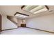 Unfinished basement featuring a staircase and a built-in bar, ready for customization at 7500 E Dartmouth Ave # 22, Denver, CO 80231