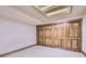 A bedroom featuring a closet with wooden doors and overhead light at 7500 E Dartmouth Ave # 22, Denver, CO 80231