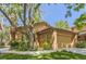 Charming single-Gathering home features a two-car garage, mature trees, and a well-maintained lawn at 7500 E Dartmouth Ave # 22, Denver, CO 80231