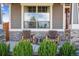 Cozy front porch with comfortable seating, perfect for enjoying the outdoors at 1644 S Lafayette St, Denver, CO 80210