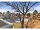 View from balcony overlooking a lush landscape and community at 13633 E Yale Ave # B, Aurora, CO 80015